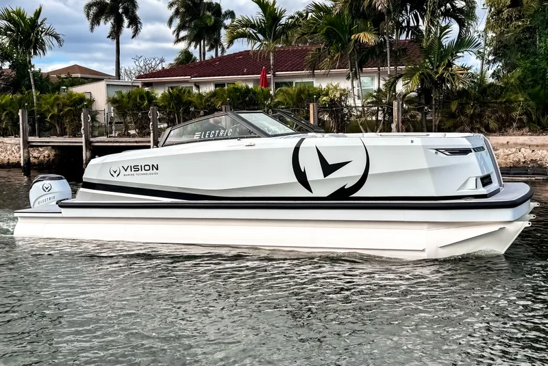 Slide: The Image of 2026 Ingenity EL electric boat on water, featuring sleek design and Vision Marine Technologies branding. - 23