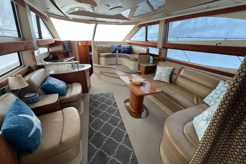 Slide: The Image of Luxurious interior of a 2007 Meridian 391 Sedan yacht with plush seating and elegant decor. - 22