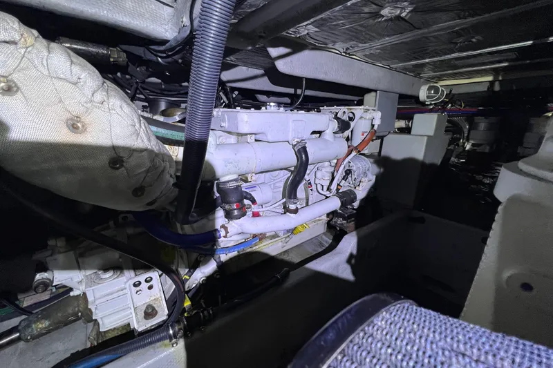 Slide: The Image of Engine compartment of a 2007 Meridian 391 Sedan boat, showcasing mechanical components. - 30