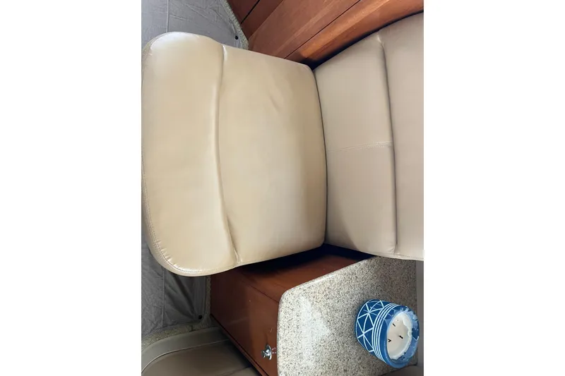 Slide: The Image of Beige leather seating in 2007 Meridian 391 Sedan interior with blue decorative candle. - 54