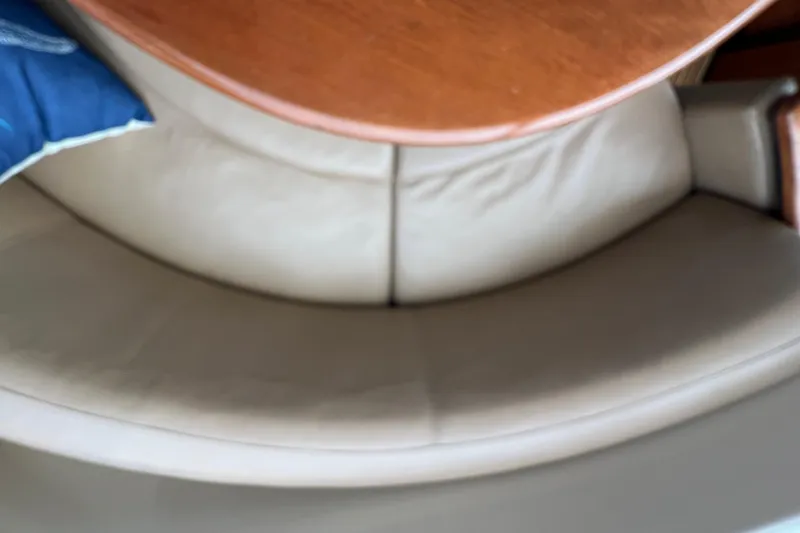 Slide: The Image of Cream leather seating with wooden table on 2007 Meridian 391 Sedan yacht. - 56