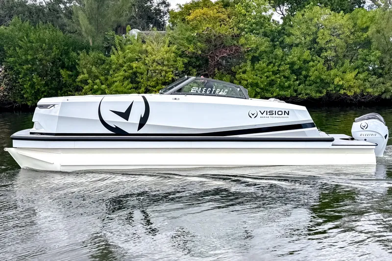 The Image of 2026 Ingenity EL electric boat cruising on a calm river, surrounded by lush greenery. - 0