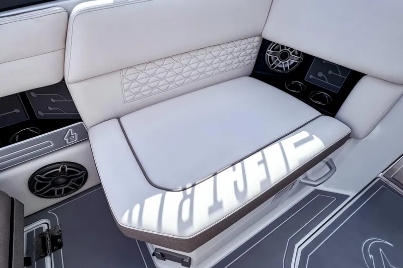 Slide: The Image of 2026 Ingenity EL boat interior with white cushioned seating and integrated speakers. - 20