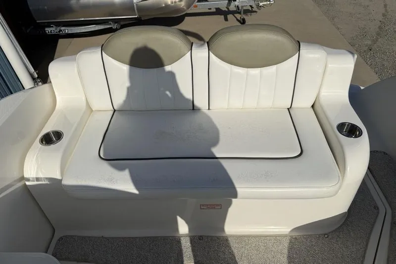Slide: The Image of White leather seating on 2007 Sea Ray Sundancer 540 boat with cup holders. - 26