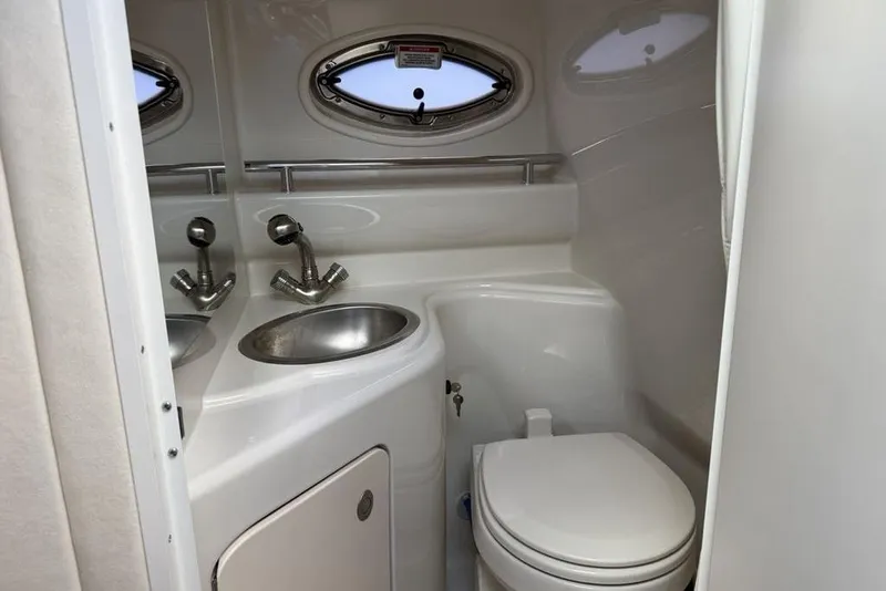 Slide: The Image of Bathroom interior of 2007 Sea Ray Sundancer 540 yacht, featuring sink and toilet. - 35