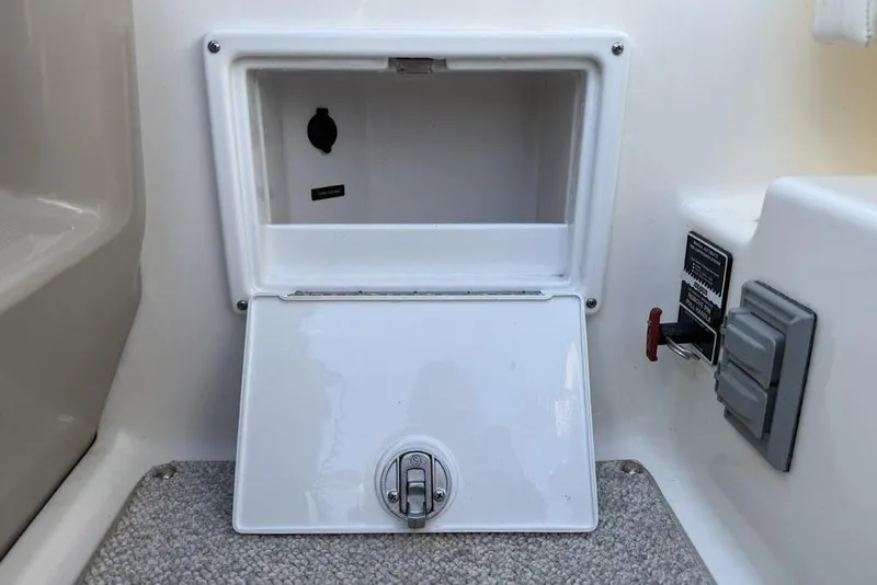 Slide: The Image of Storage compartment on a 2007 Sea Ray Sundancer 540 boat interior. - 13