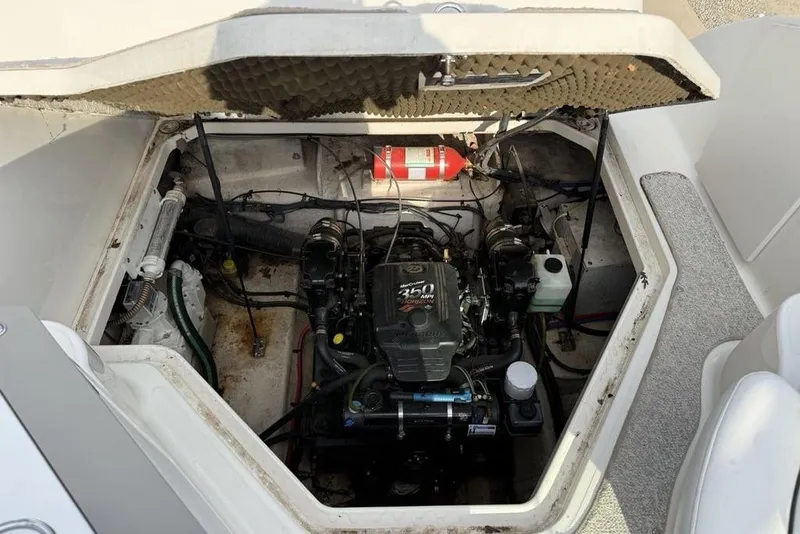 Slide: The Image of Engine compartment of a 2007 Sea Ray Sundancer 540 with visible fire extinguisher. - 23