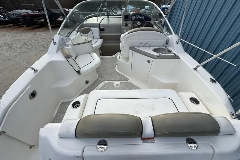 Slide: The Image of 2007 Sea Ray Sundancer 540 boat interior with seating, helm, and sink. - 42