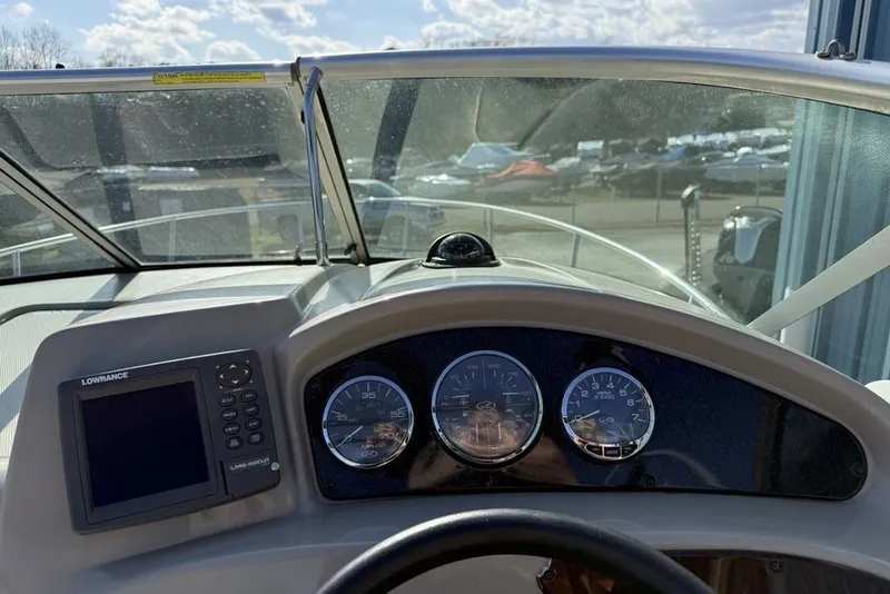 Slide: The Image of Helm of 2007 Sea Ray Sundancer 540 with gauges and Lowrance display. - 8