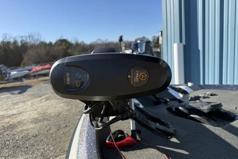 Slide: The Image of 2021 Skeeter ZXR21 boat with Ultrex i-Pilot trolling motor in outdoor setting. - 7