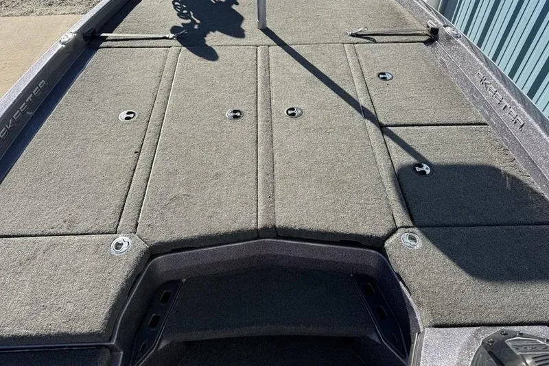 Slide: The Image of Skeeter ZXR21 2021 boat deck with gray carpeted surface. - 8