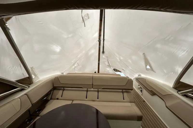 Slide: The Image of Interior of 2017 Formula 350 Crossover Bowrider with beige seating and covered canopy. - 6