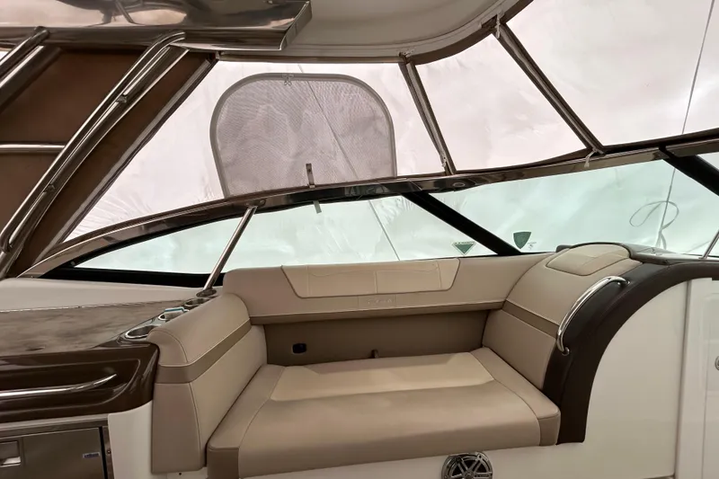 Slide: The Image of 2017 Formula 350 Crossover Bowrider interior with beige seating and sleek design. - 8