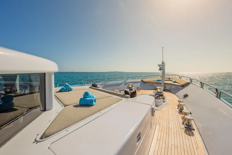 Slide: The Image of Luxurious 1988 Van Mill Custom yacht deck with sun loungers and ocean view. - 17