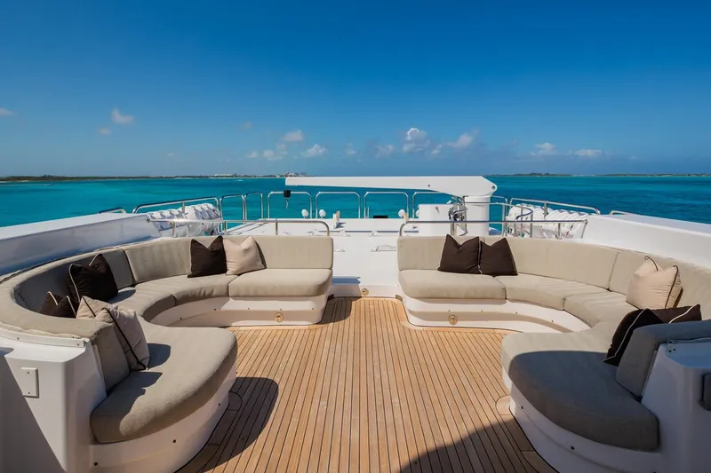 Slide: The Image of Luxurious 1988 Van Mill Custom yacht deck with elegant seating and ocean view. - 22
