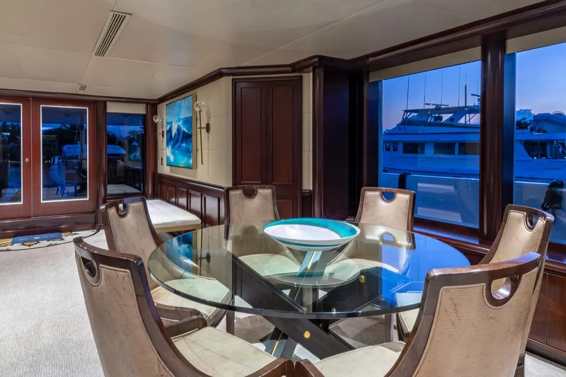 Slide: The Image of Luxurious 1988 Van Mill Custom yacht interior with elegant dining area and large windows. - 30