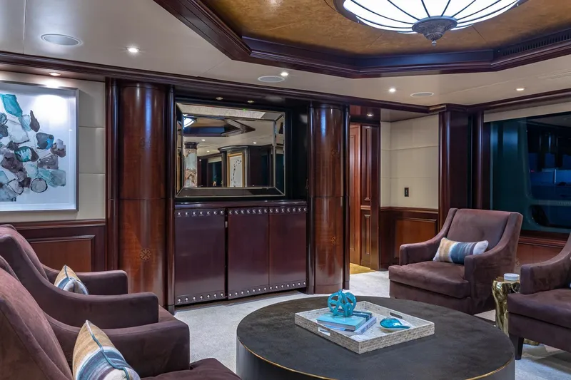 Slide: The Image of Luxurious yacht interior with elegant seating, modern art, and ambient lighting, Van Mill Custom 1988. - 37