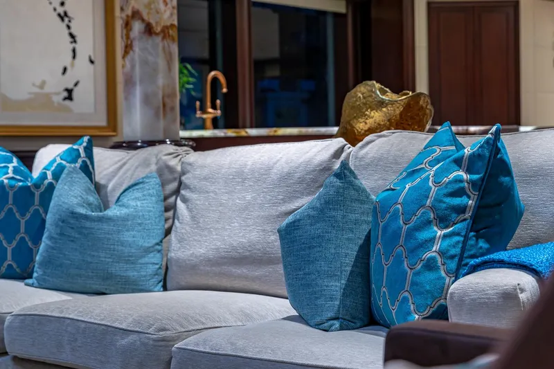 Slide: The Image of Luxurious yacht interior with blue cushions on a gray sofa, Van Mill Custom 1988. - 39