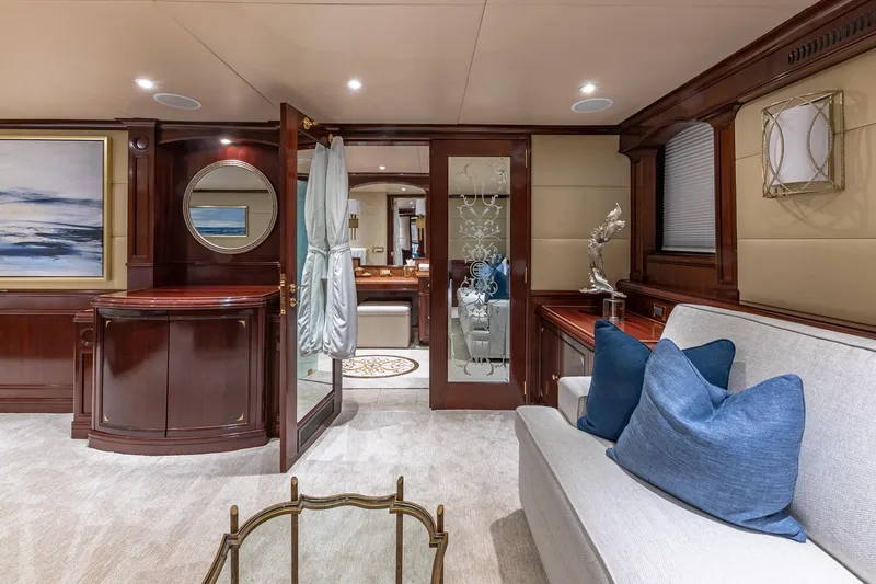 Slide: The Image of Luxurious 1988 Van Mill Custom yacht interior with elegant wood finishes and plush seating. - 53