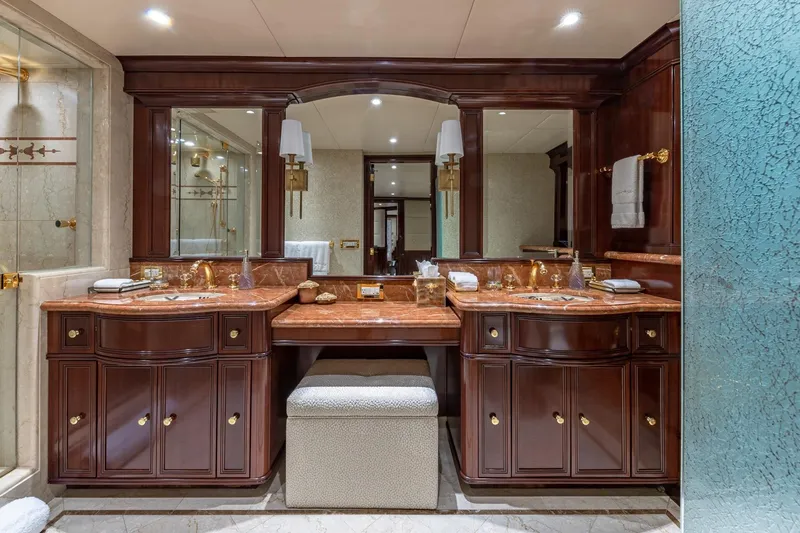 Slide: The Image of Luxurious 1988 Van Mill custom bathroom with elegant wood cabinetry and marble countertops. - 59