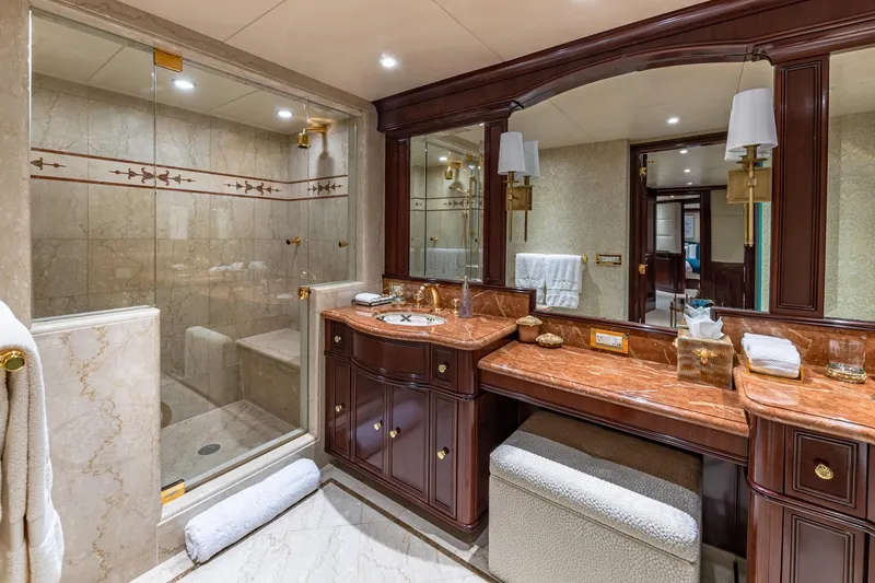 Slide: The Image of Luxurious 1988 Van Mill custom bathroom with marble countertops and glass shower enclosure. - 60