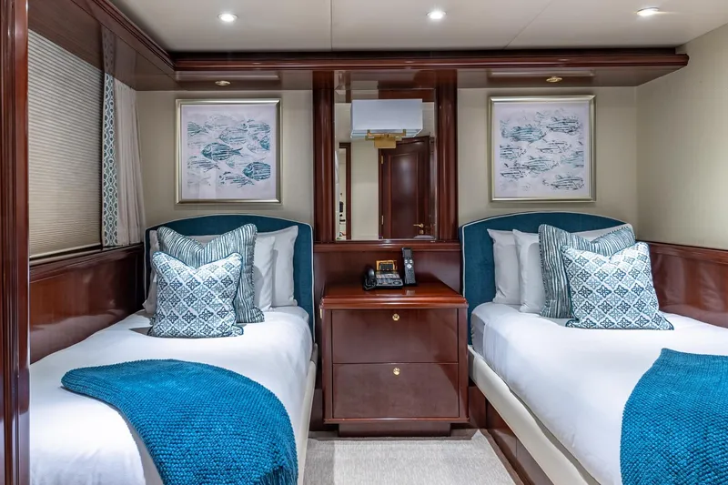 Slide: The Image of Luxurious 1988 Van Mill Custom yacht cabin with twin beds, elegant decor, and plush pillows. - 63