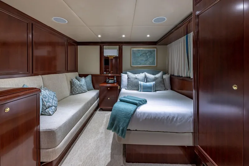 Slide: The Image of Luxurious 1988 Van Mill Custom yacht cabin with elegant wood paneling and plush bedding. - 66