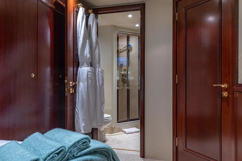 Slide: The Image of Luxurious 1988 Van Mill Custom yacht interior with elegant wood finishes and modern bathroom. - 70