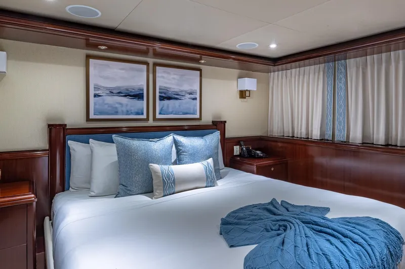 Slide: The Image of Luxurious 1988 Van Mill Custom yacht bedroom with elegant decor and plush bedding. - 73
