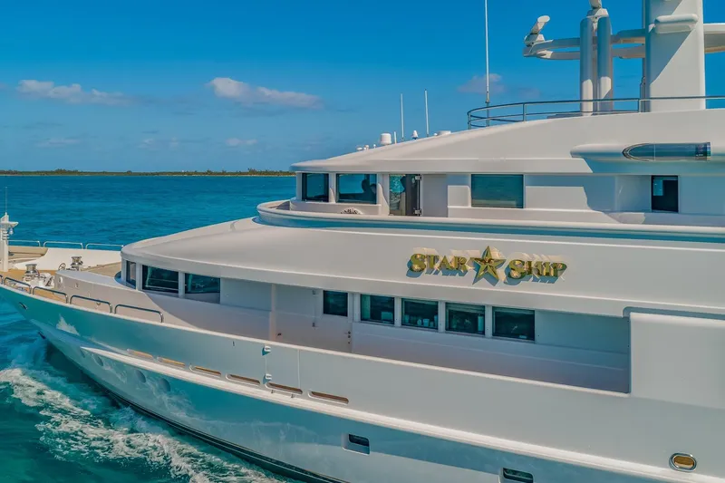 Slide: The Image of Luxurious 1988 Van Mill Custom yacht "Star Ship" cruising in clear blue waters. - 8