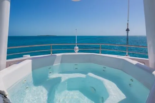 Slide: The Image of Luxurious yacht jacuzzi with ocean view, Van Mill Custom 1988 model. - 87