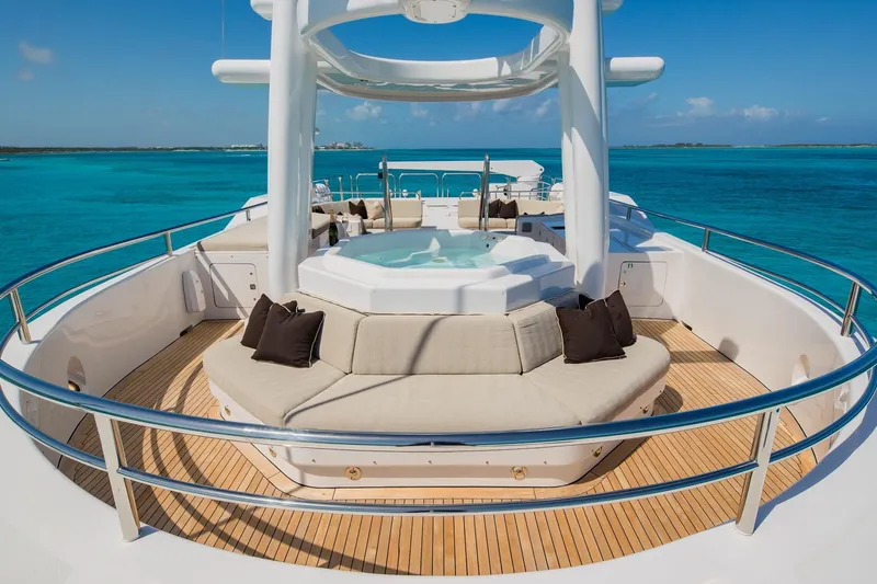 Slide: The Image of Luxurious 1988 Van Mill Custom yacht deck with jacuzzi and ocean view. - 88