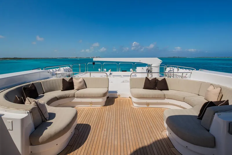 Slide: The Image of Luxurious 1988 Van Mill Custom yacht deck with elegant seating and ocean view. - 90