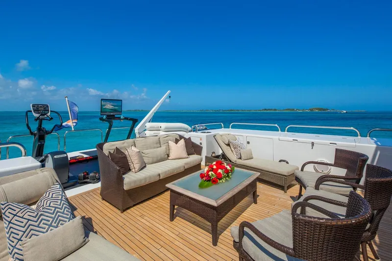 Slide: The Image of Luxurious 1988 Van Mill Custom yacht deck with elegant seating and ocean view. - 93