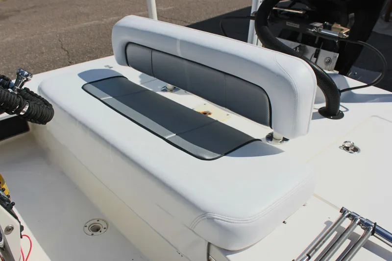 Slide: The Image of Sterling TR7 2017 boat seat with white and gray upholstery on deck. - 11