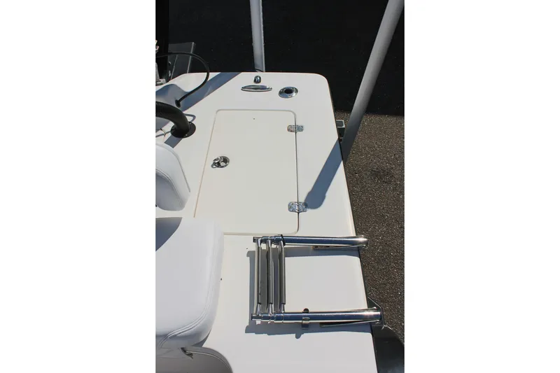 Slide: The Image of 2017 Sterling TR7 boat deck with ladder and storage compartment. - 12