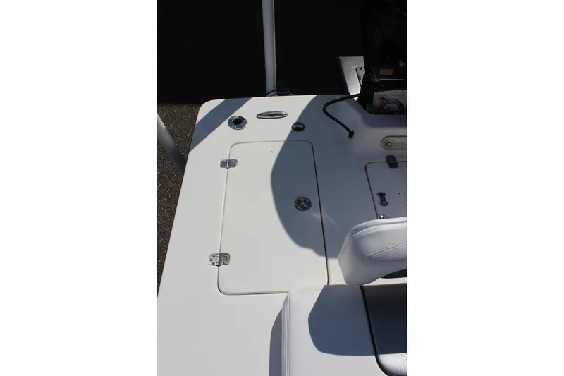 Slide: The Image of 2017 Sterling TR7 boat deck with storage compartment and seating. - 14