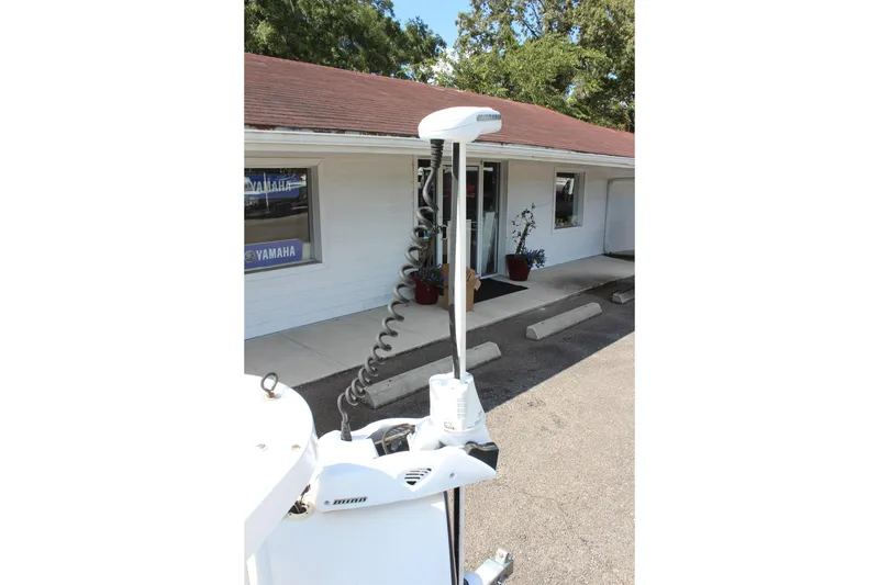 Slide: The Image of Outdoor view of Sterling TR7 2017 model near a building with Yamaha signage. - 22