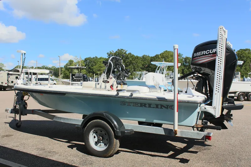 Slide: The Image of 2017 Sterling TR7 boat with Mercury outboard motor on trailer. - 4