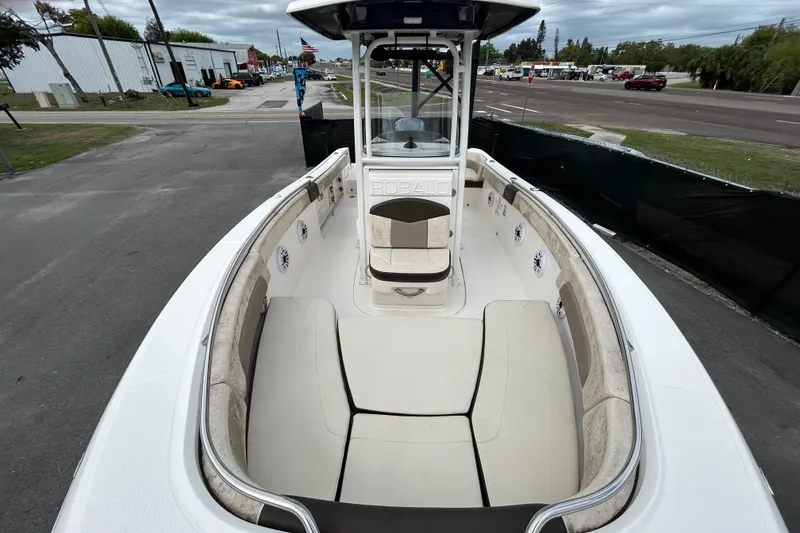 Slide: The Image of 2019 Robalo R242 Explorer boat interior with spacious seating and modern design. - 26