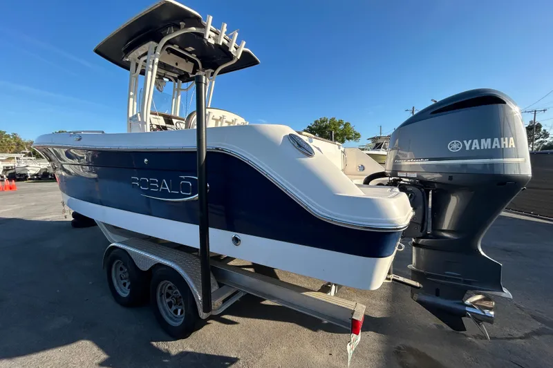 Slide: The Image of 2019 Robalo R242 Explorer with 300 horsepower engine, outdoor display. - 4