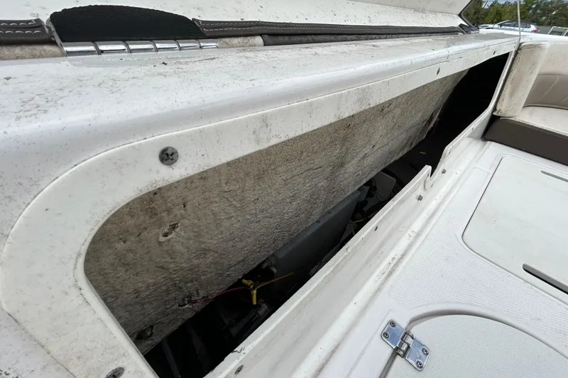 Slide: The Image of Open storage compartment on a 2019 Robalo R242 Explorer boat. - 50