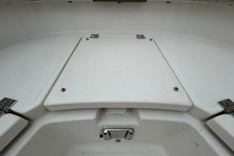 Slide: The Image of 2019 Robalo R242 Explorer boat deck with storage compartment. - 70