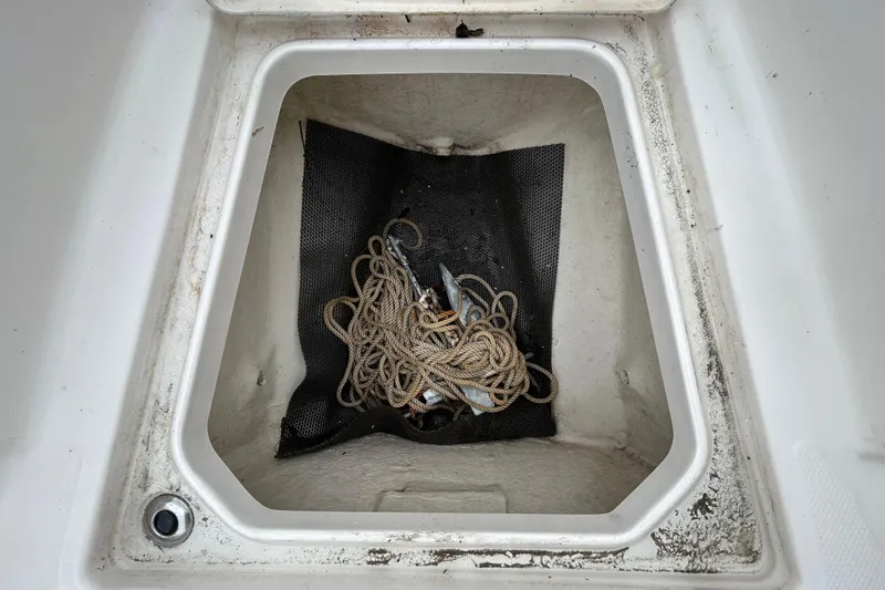 Slide: The Image of Storage compartment with rope in 2019 Robalo R242 Explorer boat. - 81
