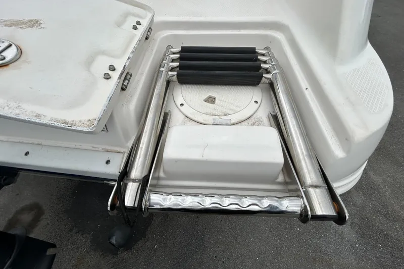 Slide: The Image of 2019 Robalo R242 Explorer boat ladder and deck detail. - 88
