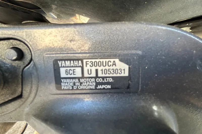 Slide: The Image of Yamaha F300UCA engine label on 2019 Robalo R242 Explorer boat. - 92