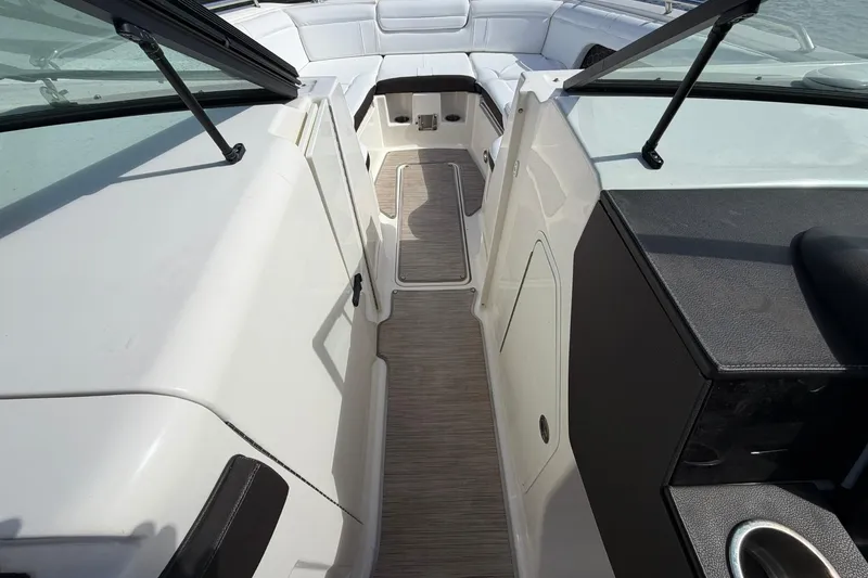 Slide: The Image of 2020 Sea Ray SDX 290 Outboard interior with sleek design and comfortable seating. - 19