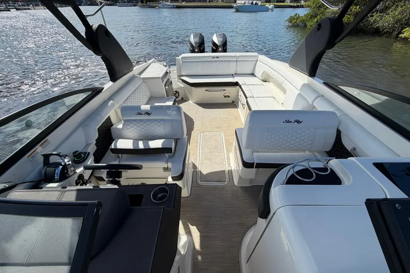 Slide: The Image of 2020 Sea Ray SDX 290 Outboard boat interior with luxurious seating and modern design. - 23