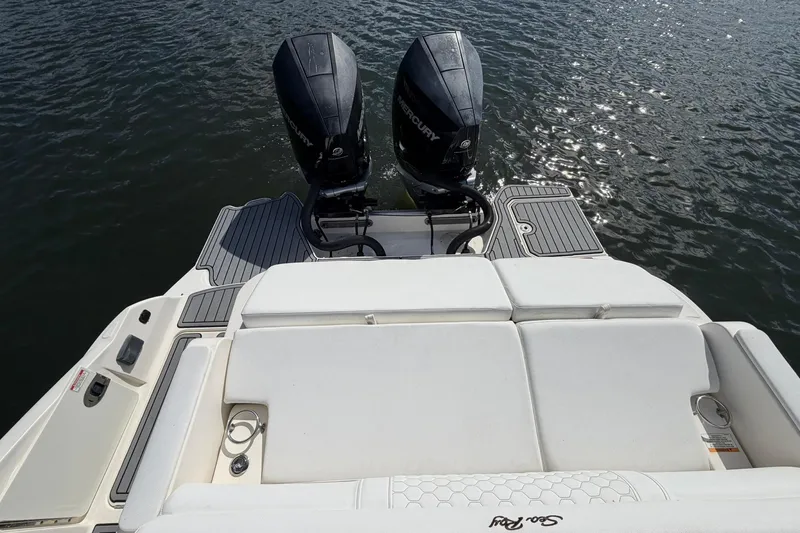 Slide: The Image of 2020 Sea Ray SDX 290 Outboard with dual engines on water. - 6