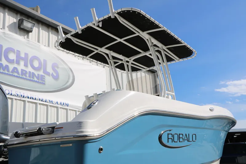 Slide: The Image of 2026 Robalo R200 Center Console boat at Nichols Marine dealership. - 8